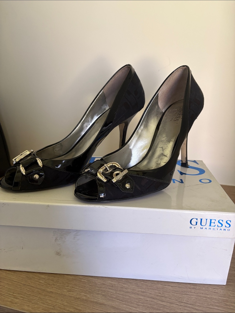 GUESS Black Patent Peep-Toe Heels with Gold Buckle Detail